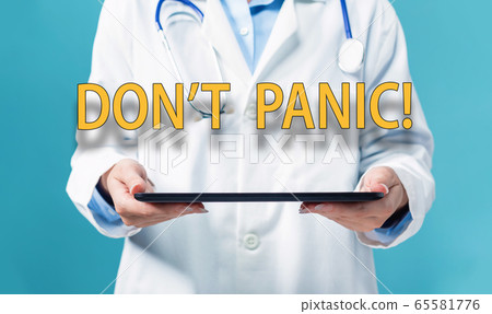 Dont Panic theme with a doctor using a tablet pc 65581776