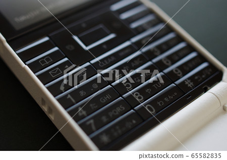 Cell phone button up 65582835