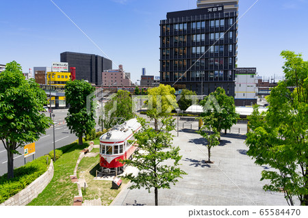 Gifu Station North Exit Square in front of Meitetsu Mo 510 type (maru window train) Mo 513 65584470