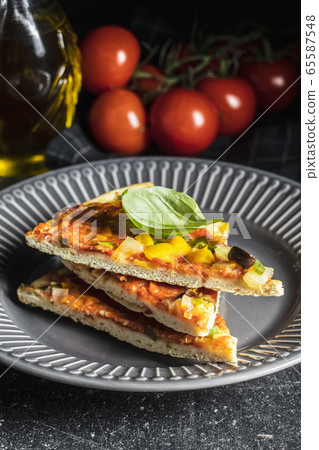 Tasty salami pizza. 65587548