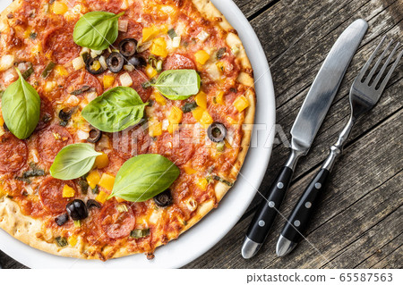 Tasty salami pizza. Tasty salami pizza. 65587563