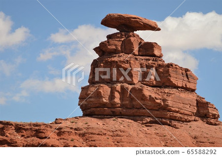 Exquisite balance. Hat Rock found near Monument Valley Exquisite balance. Hat Rock found near Monument Valley 65588292