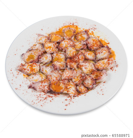 Typical Galician dish of fair style octopus with red pepper. 65588971