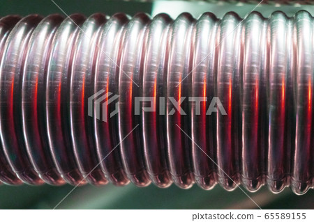 Corrugated metal hose for fuel supply, Close - up. Corrugated metal hose for fuel supply, Close - up. 65589155