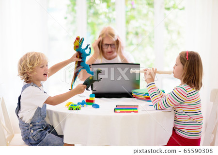 Mother working from home with kids. Quarantine. 65590308