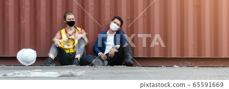 Foreman and engineering woman sitting unhappy stressed after being laid off. 65591669