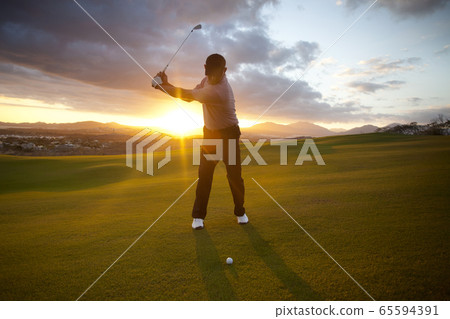Man playing golf. Man playing golf. 65594391