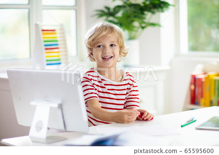 Online remote learning. School kids with computer. Online remote learning. School kids with computer. 65595600