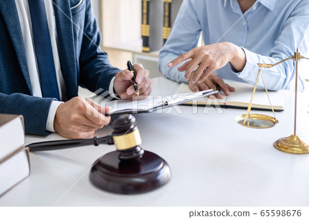 Businesswoman and Male lawyer or judge consult and 65598676