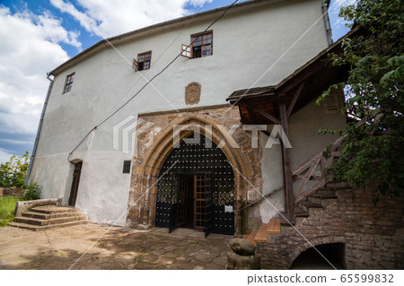 View to the historical ruined castle in Ostrog, Ukraine 65599832