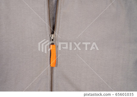 Orange zipper on sweatshirt design and fashion concept Orange zipper on sweatshirt design and fashion concept 65601035