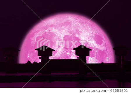 Super strawberry pink moon and silhouette dam in 65601801