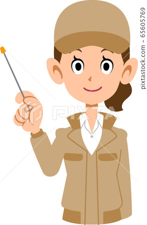 Upper body of woman wearing beige workwear with pointing stick 65605769