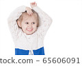 closeup portrait of a little smiling three year 65606091
