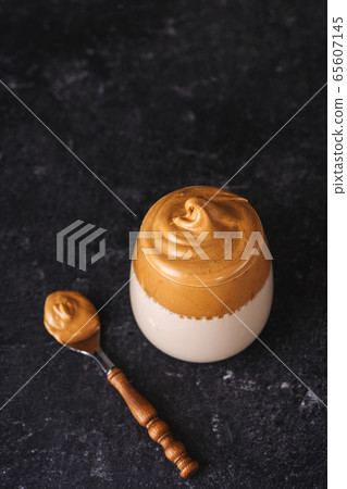 Top view of a glass with creamy and foamy whipped 65607145