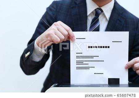 Shredder (office businessman work faceless copy space person electronics suit male) 65607478