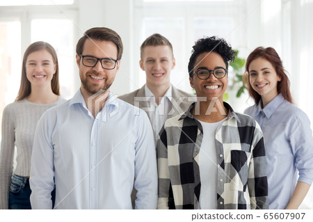 Multiethnic professional leaders and employees looking at camera, portrait 65607907