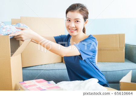 woman, moving house, new life woman, moving house, new life 65610664