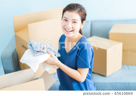 woman, moving house, new life woman, moving house, new life 65610669