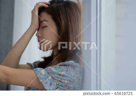 Woman, stressful, down mood 65610725