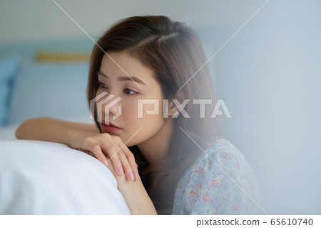 Woman, stressful, down mood 65610740