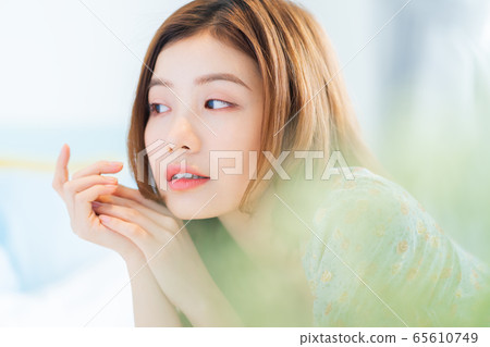 Beautiful woman, bedroom, morning 65610749