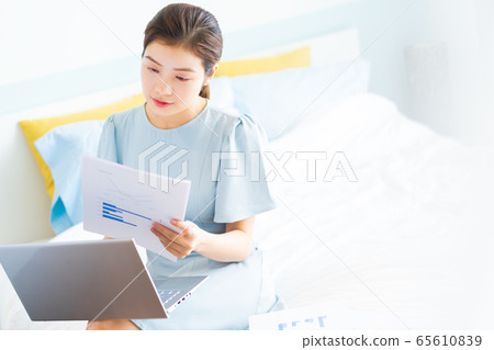 Beautiful woman, working at home Beautiful woman, working at home 65610839