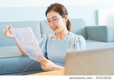 Beautiful woman, working at home Beautiful woman, working at home 65610856
