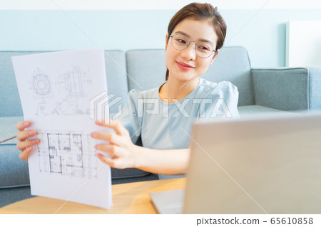 Beautiful woman, working at home Beautiful woman, working at home 65610858