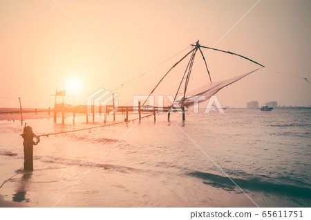 Sunset at tropical beach. Ocean coast landscape 65611751