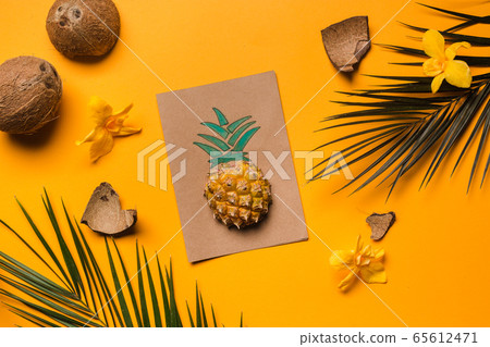 creative tropical greeting cards with pineapple and tropical leaves 65612471