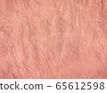 Concrete texture painted in trendy rose gold 65612598
