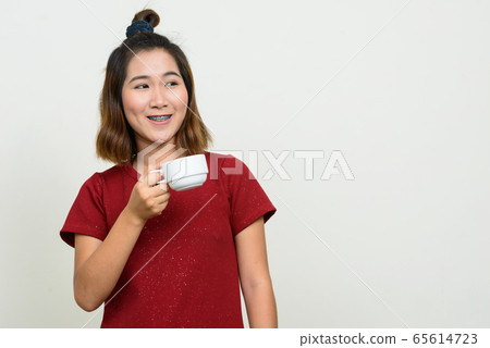 Portrait of young Asian woman with short hair Portrait of young Asian woman with short hair 65614723