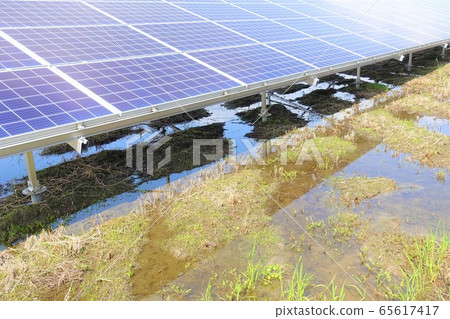 Solar power plant with rain Solar power plant with rain 65617417