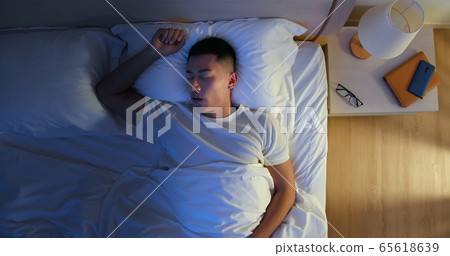 Man Snores At Night 65618639
