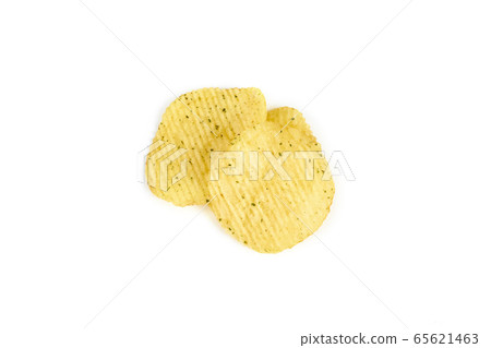 Yellow crispy ridged potato chips on white background Yellow crispy ridged potato chips on white background 65621463