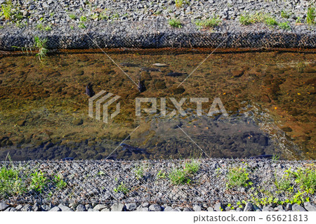 Clean river after river maintenance work using a basket mat 65621813