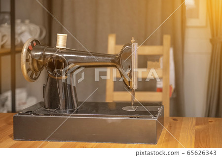 Sewing machine retro black traditional industrial Sewing machine retro black traditional industrial 65626343