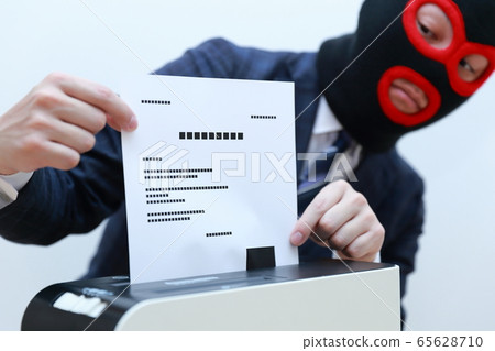 Shredder (criminal cover-up faceless copy space person electrical appliance suit male suspicious danger) 65628710