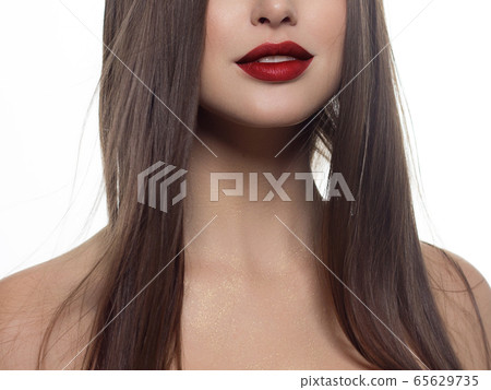 Cosmetics, makeup and trends. Bright lip gloss and Cosmetics, makeup and trends. Bright lip gloss and 65629735