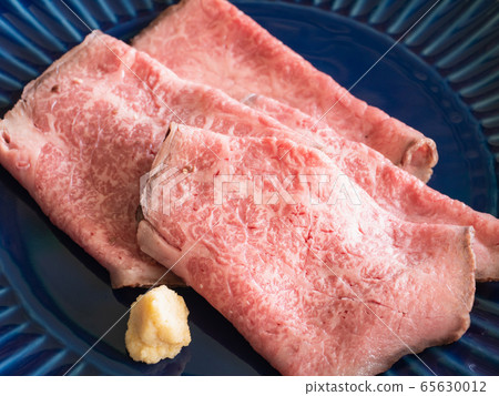 Close up of fresh roast beef. Close up of fresh roast beef. 65630012