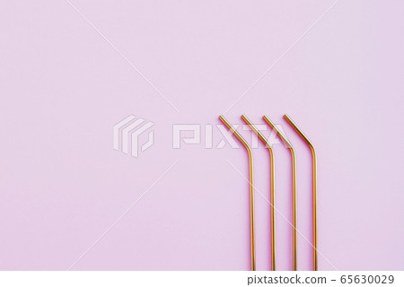 Reusable eco-friendly golden metal straws. Reusable eco-friendly golden metal straws. 65630029