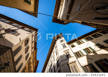 Old houses in Florence downtown seen from below - Tuscany Italy Old houses in Florence downtown seen from below - Tuscany Italy 65631041