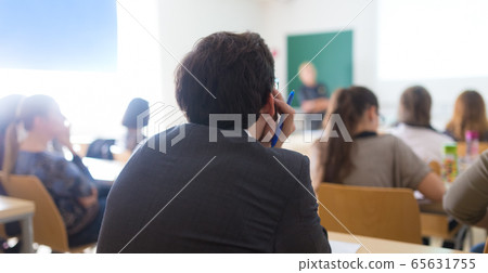 Lecturer at university. 65631755