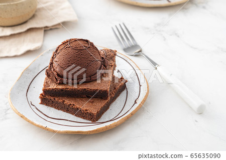 Chocolate Brownie with Ice Cream. Copy space. 65635090