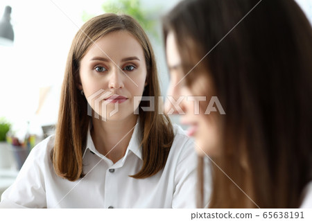 Concerned business lady 65638191