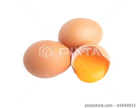 two eggs and broken raw egg isolated on the white two eggs and broken raw egg isolated on the white 65640015