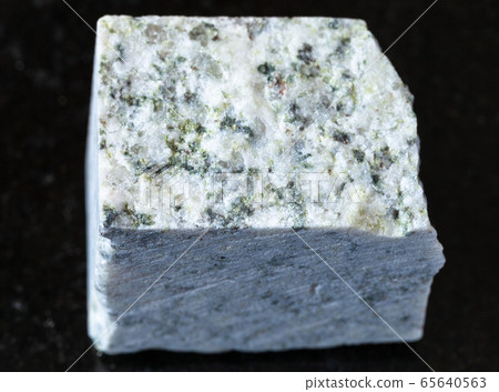 raw white Granite rock on black raw white Granite rock on black 65640563