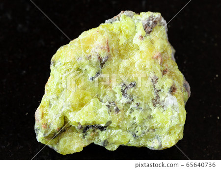 rough native Sulphur (Sulfur) rock on black 65640736