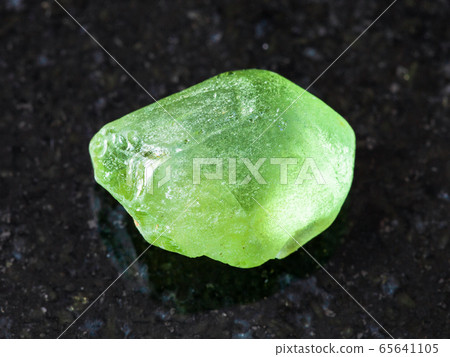 rough Olivine (Peridot, Chrysolite) on black 65641105